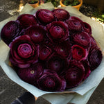 Bouquet of deep burgundy Ranunculus Elegance Noir flowers